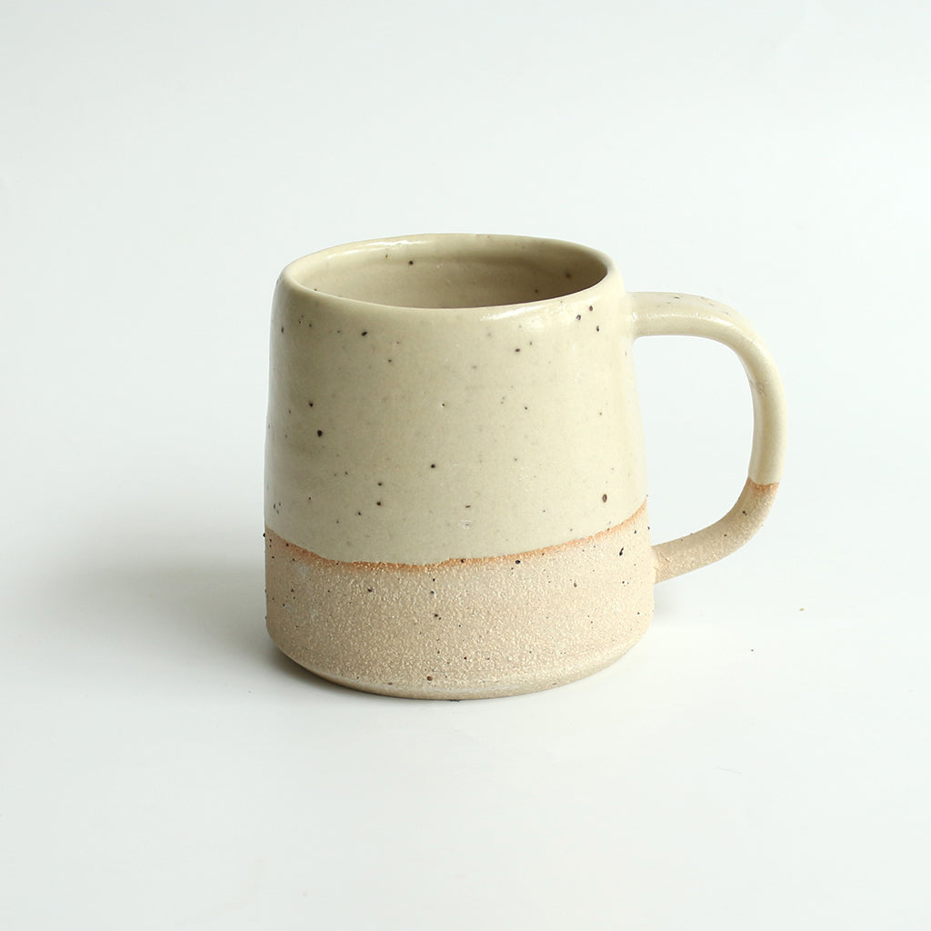 Light yellow stoneware mug