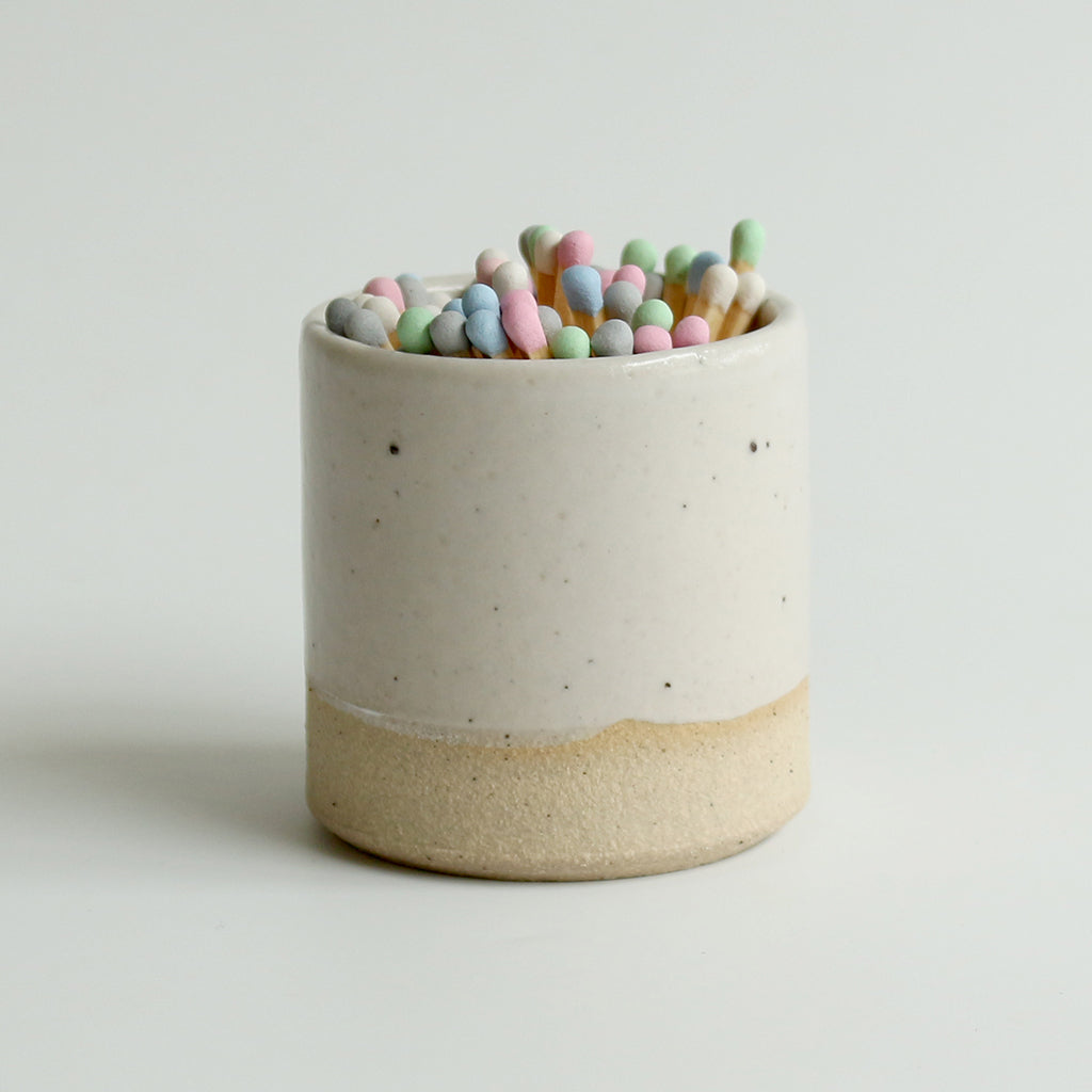 Off-White match pot with pastel matches