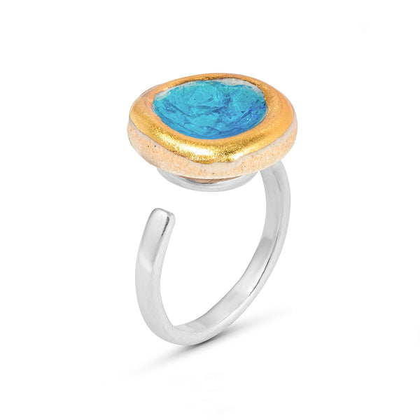 Side view of turquoise blue gradient lagoon glass small round sterling silver adjustable ring gold lustre