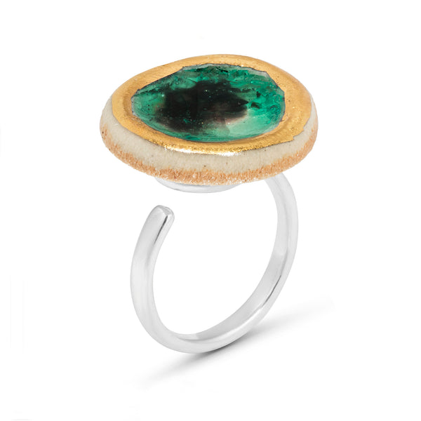 Side view of emerald green reef glass large round sterling silver adjustable ring outlined in gold lustre