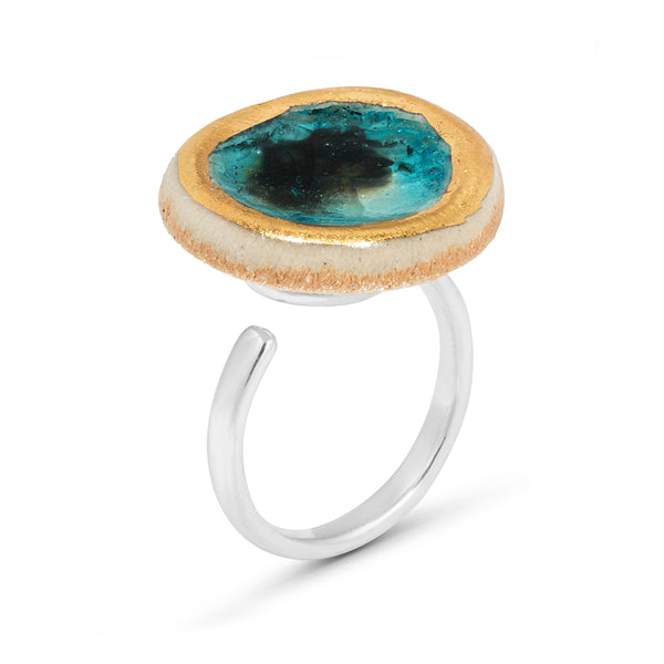 Side view of turquoise reef glass large round sterling silver adjustable ring outlined in gold lustre