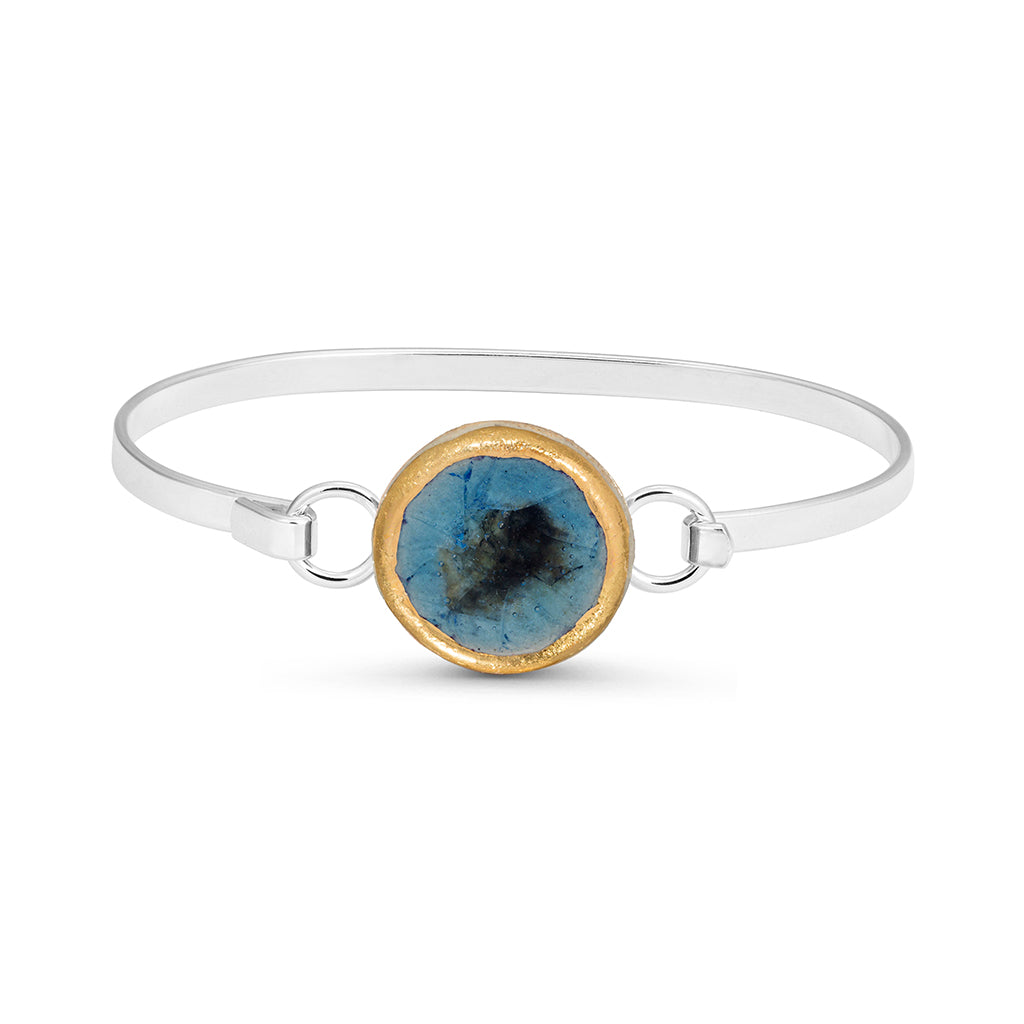 Blue reef crackled glass round charm outlined in gold lustre on a silver plated latch bangle