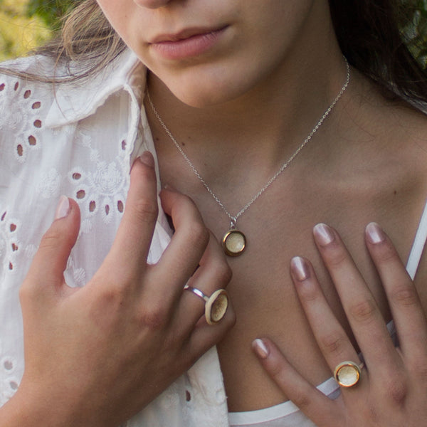 model wearing Crystal Pool small round ceramic and glass necklace and rings - Habulous